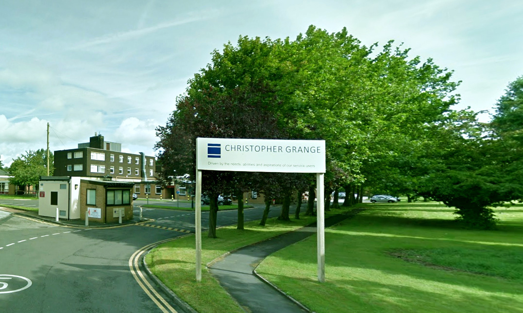 Photograph of the outside sign of the Christopher Grange Rhona House Catholic Blind Institute located at Youens Way, Liverpool L14 2EW, United Kingdom. The sign reads, Christopher Grange. Driven by the needs, abilities and aspirations of our service users.